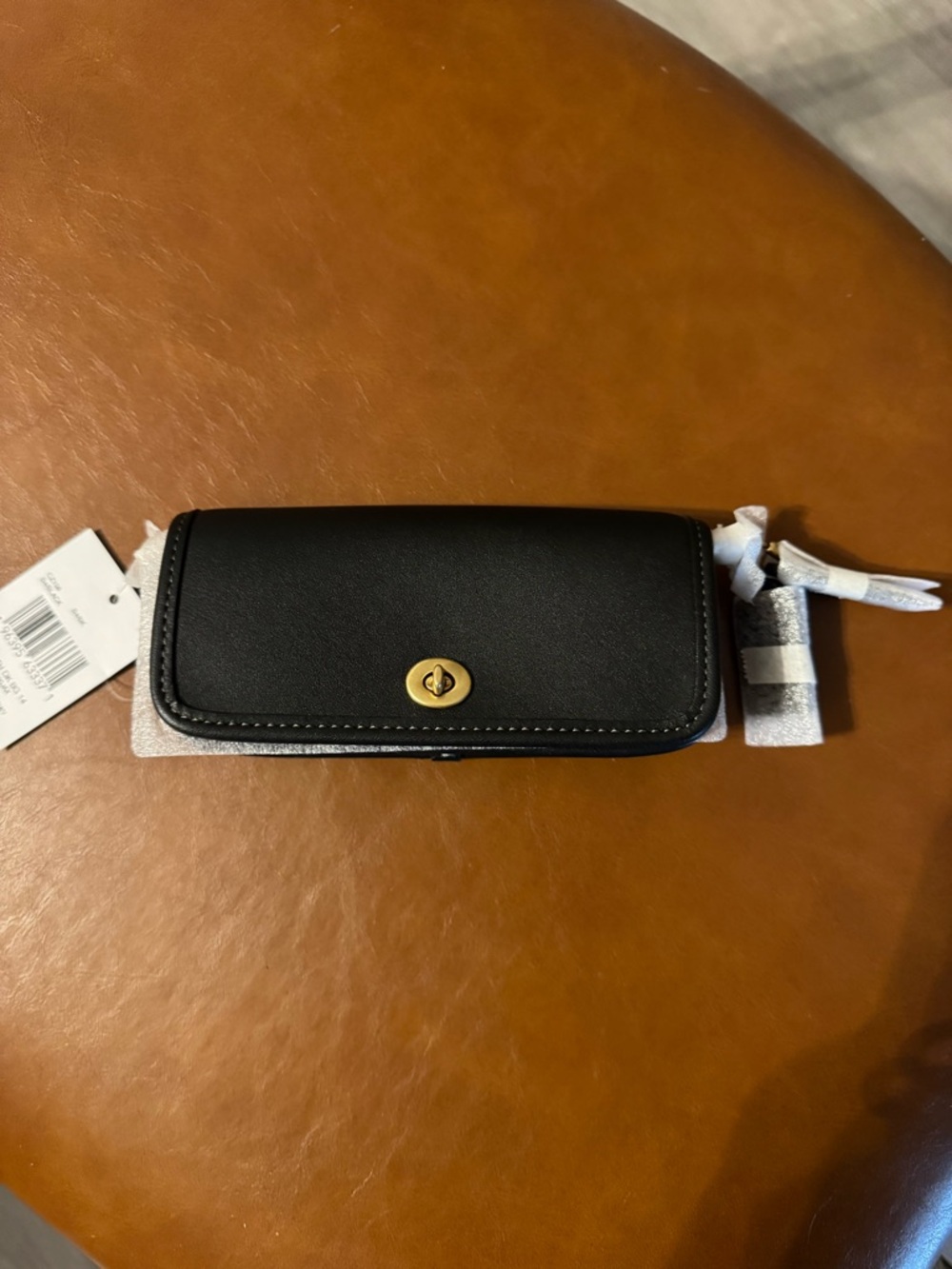 Coach black Dinky 14